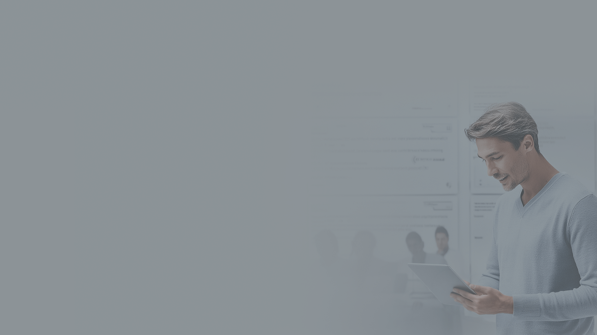 Man looking at tablet