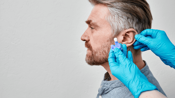Dental professional fitting ear loop