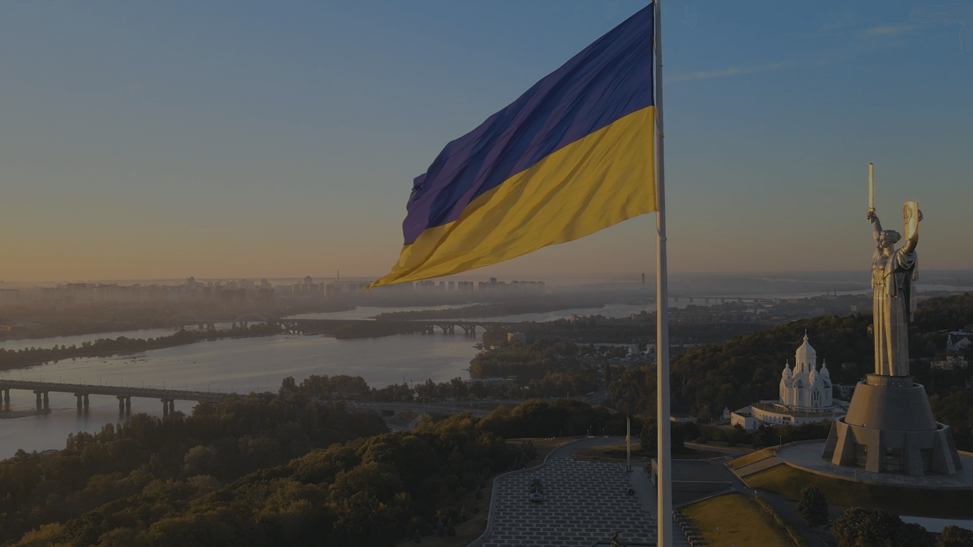 Ukraine flag on the background of the Kyiv city